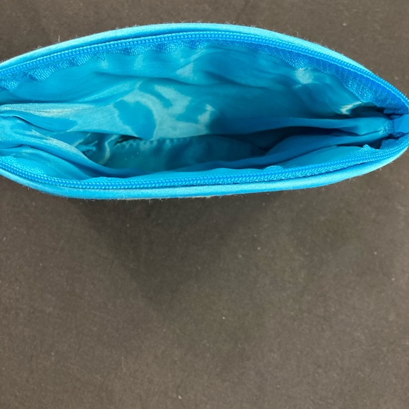 Small Turquoise makeup purse with flower embroidery. - Picture 6 of 7